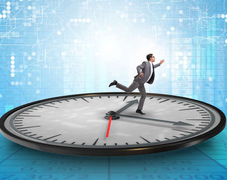 The businessman in time management conceptの写真素材