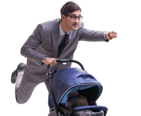 Young businessman nursing child in pram isolated on whiteの写真素材