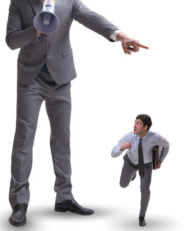 The bad angry boss shouting at employee with loudspeakerの写真素材
