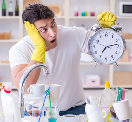 Man failing to meet the deadlines of housekeeping jobの写真素材