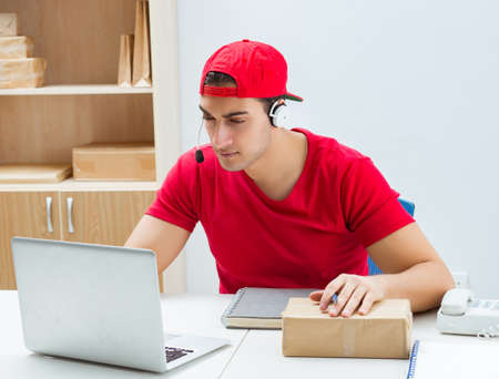 Call center worker at parcel distribution center in post office