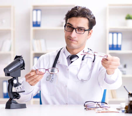 Eye doctor in medical conceptの写真素材