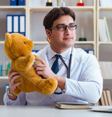 Doctor veterinary pediatrician holding an examination in the offの写真素材