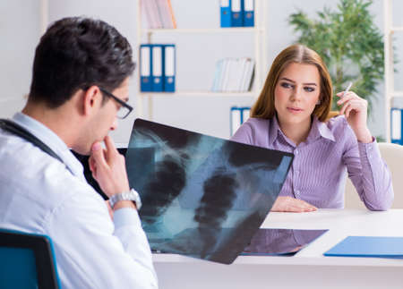 Doctor examining x-ray images of patient