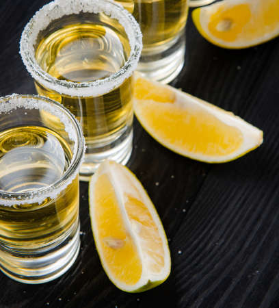 Tequila drink served in glasses with lime and salt