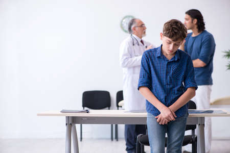 Young boy visiting doctor in hospitalの写真素材