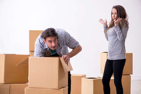 Young pair couples moving to new flat