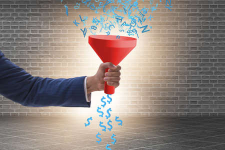 Data monetization concept with funnel and businessmanの写真素材