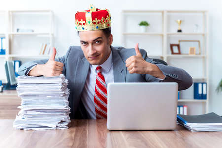King businessman at his workplaceの写真素材