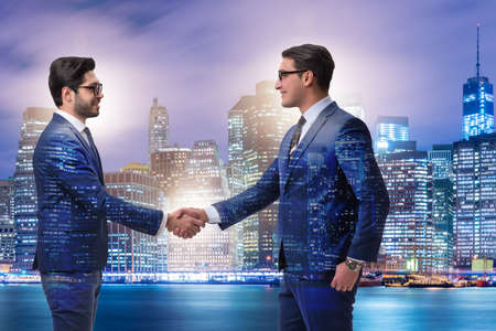 Businessman shaking hands in agreement