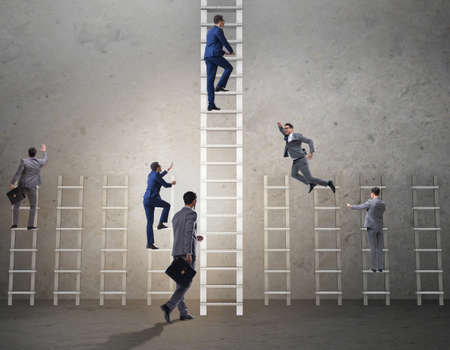 Competition concept with businessman beating competitorsの写真素材