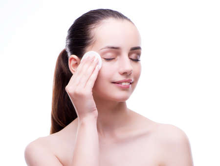 Woman in beauty concept applying make up using cosmeticsの写真素材