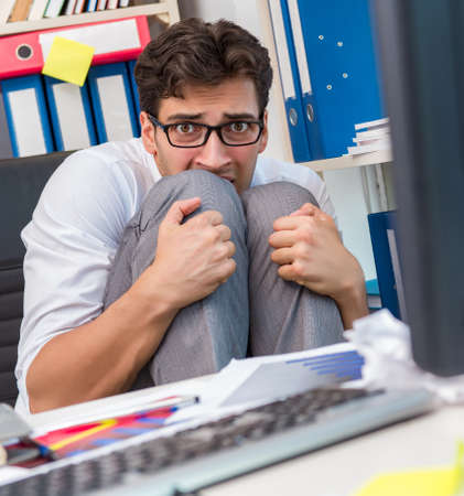 The angry and scary businessman in the officeの写真素材