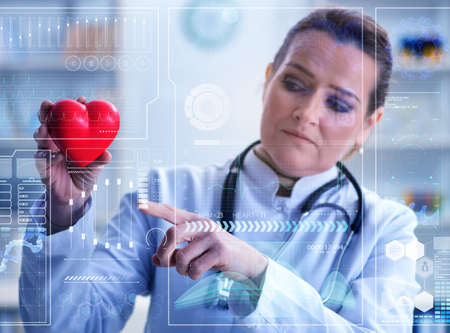Woman doctor in telemedicine cardiology conceptの写真素材