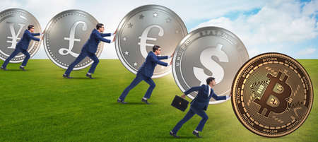 Businessman pushing bitcoin in cryptocurrency conceptの写真素材