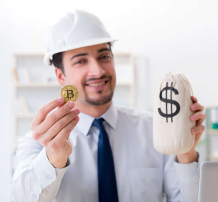 Man in bitcoin mining business conceptの写真素材