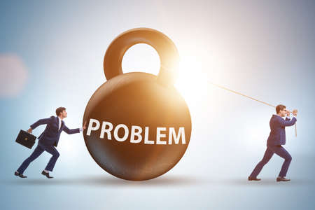 Businessmen trying to deal with difficult problemの写真素材