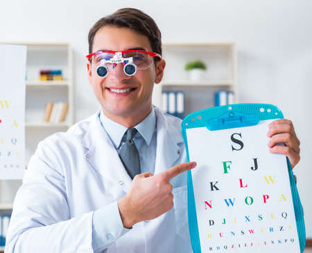 Eye doctor in eyecare concept in hospitalの写真素材