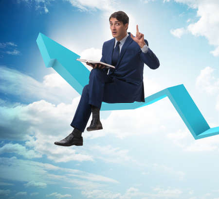 Businessman in economic recovery conceptの写真素材