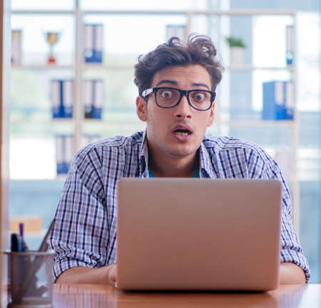 Student studying at home preparing for examの写真素材