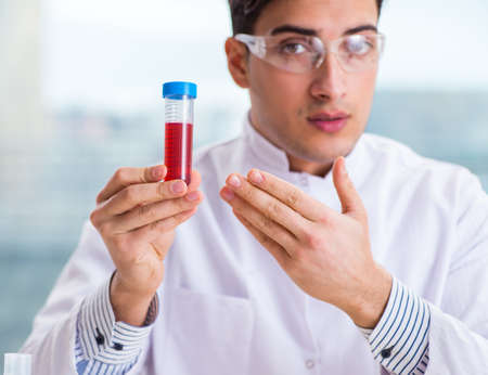 Male chemist working in labの写真素材