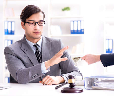 Lawyer being offered bribe for his servicesの写真素材
