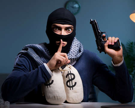 Terrorist burglar with gun asking for money ransom