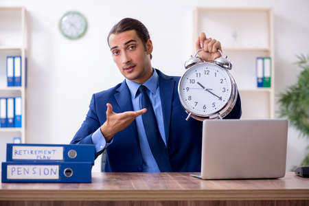 Young male accountant working in the officeの写真素材