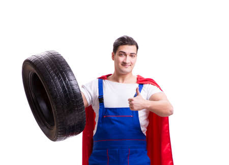 Superhero man with tyre isolated white backgroundの写真素材