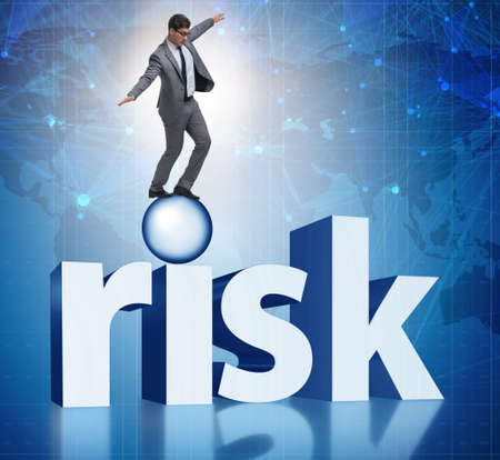 Young businessman in business risk and uncertainty conceptの写真素材