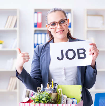 Businesswoman quitting her job in officeの写真素材