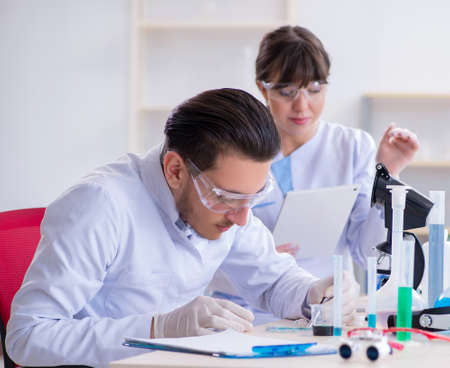 Team of chemists working in the labの写真素材