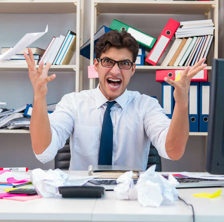 The angry and scary businessman in the officeの写真素材