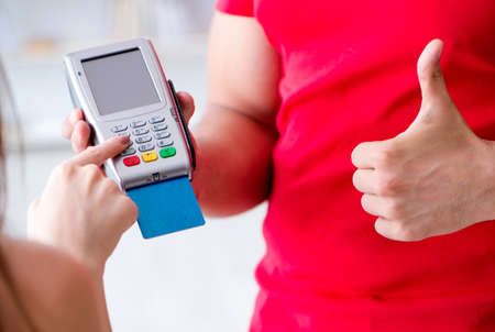 Concept of paying with POS terminal