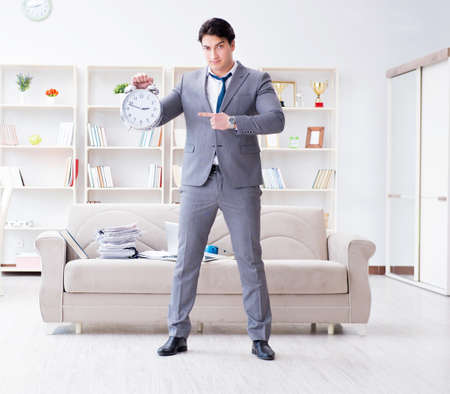 Businessman happy meeting his deadlinesの写真素材