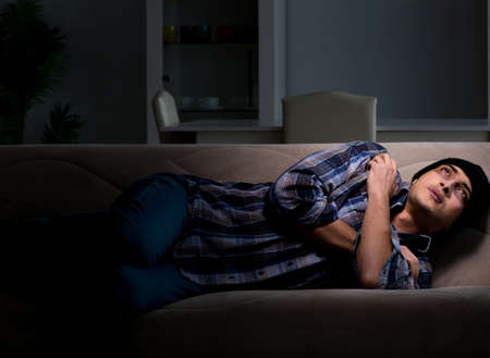The young man in agony having problems with narcotics