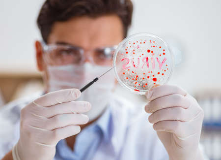 Male doctor working in the lab on virus vaccine