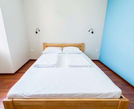 Double bed in the hotelの写真素材