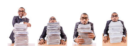 Busy businessman with lots of papers