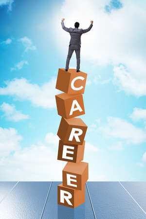 The career concept with businessman on top of blocksの写真素材