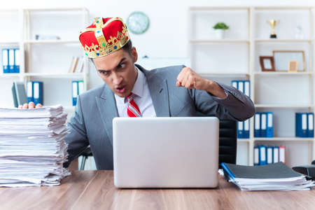 King businessman at his workplaceの写真素材