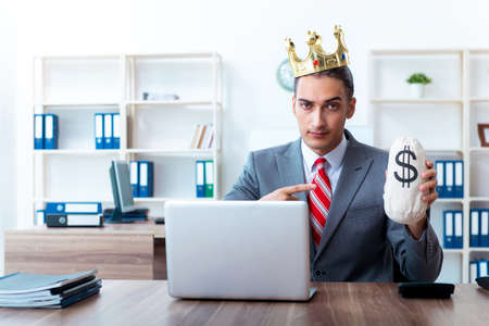 King businessman at his workplaceの写真素材