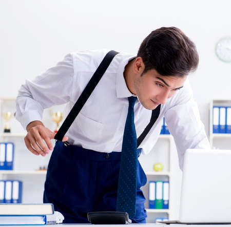 The young stylish businessman working in the officeの写真素材