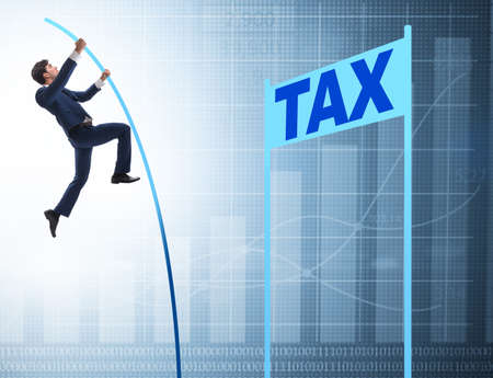 The businessman jumping over tax in tax evasion avoidance concepの写真素材