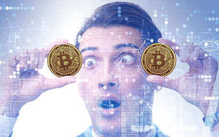 Businessman sad about bitcoin price crashの写真素材