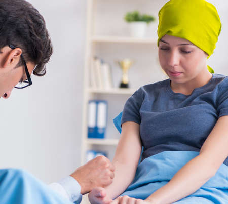 Cancer patient visiting doctor for medical consultation in cliniの写真素材