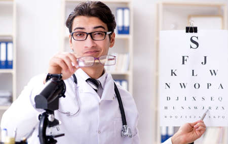Eye doctor in medical conceptの写真素材