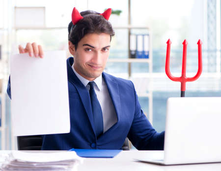 The devil angry businessman in the officeの写真素材