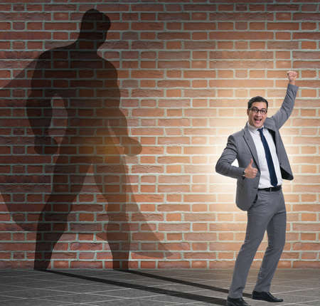 The businessman with aspiration of becoming superheroの写真素材