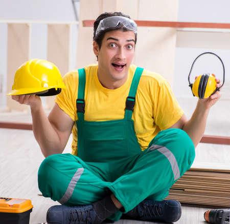 Worker showing the importnace of wearing noise cancelling headph